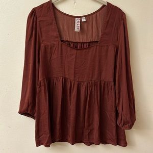 Anthropology woman’s top, size small